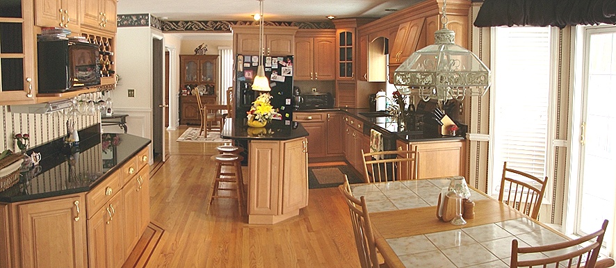 Black Granite Countertops and Maple Cabinets Transitional Kitchen Black